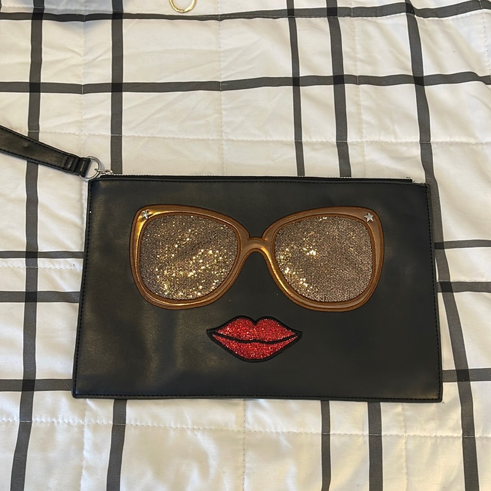 Carlos Santana Wristlet